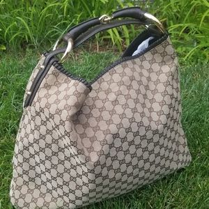 Gucci brown GG canvas large horsebit hobo with gol